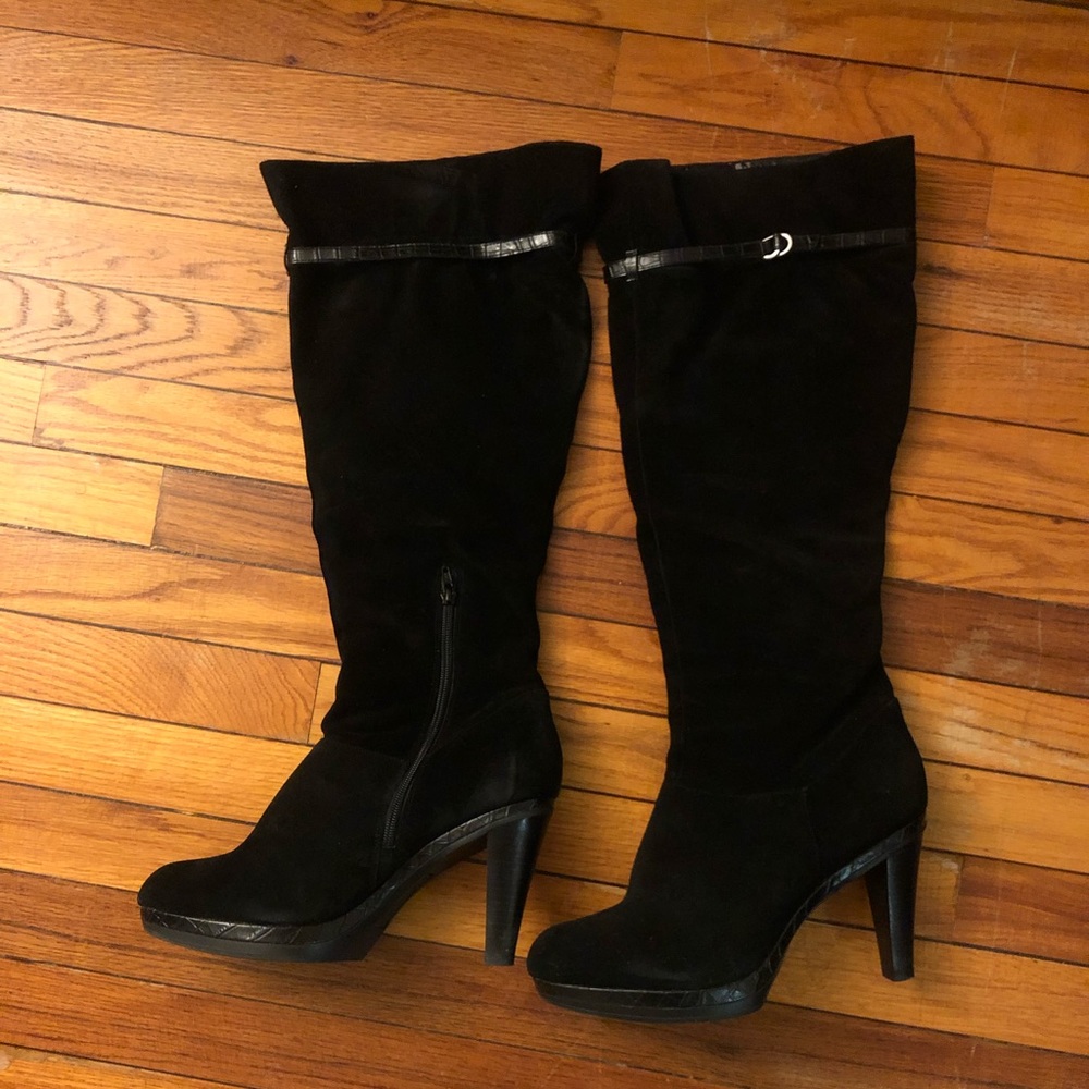 Black suede tall boots. With zipper on the side and belt on top. Worn 3 times